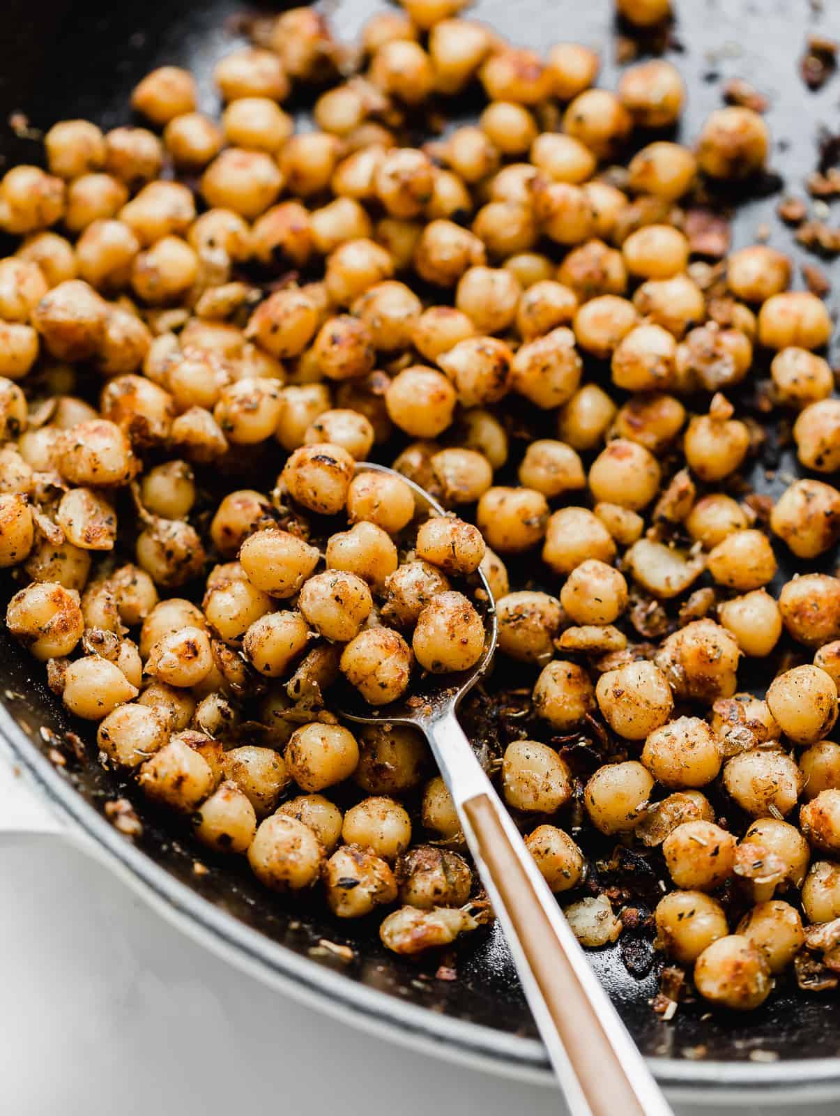 Crispy chickpeas in a skillet.