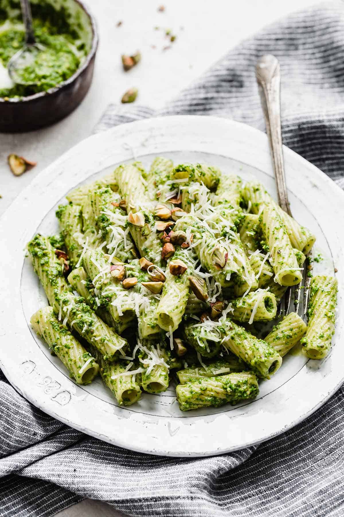 Kale Pesto Pasta on a white plate.