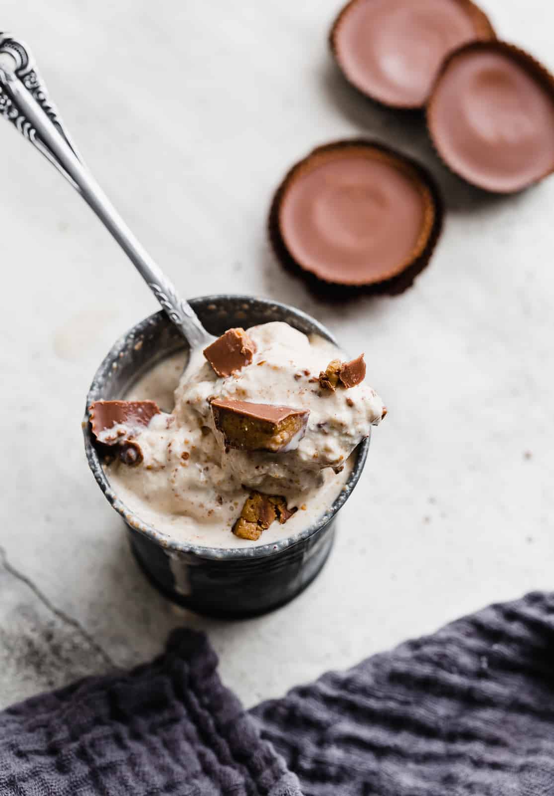 A spoon scooping out some homemade Reese's peanut butter cup blizzard.