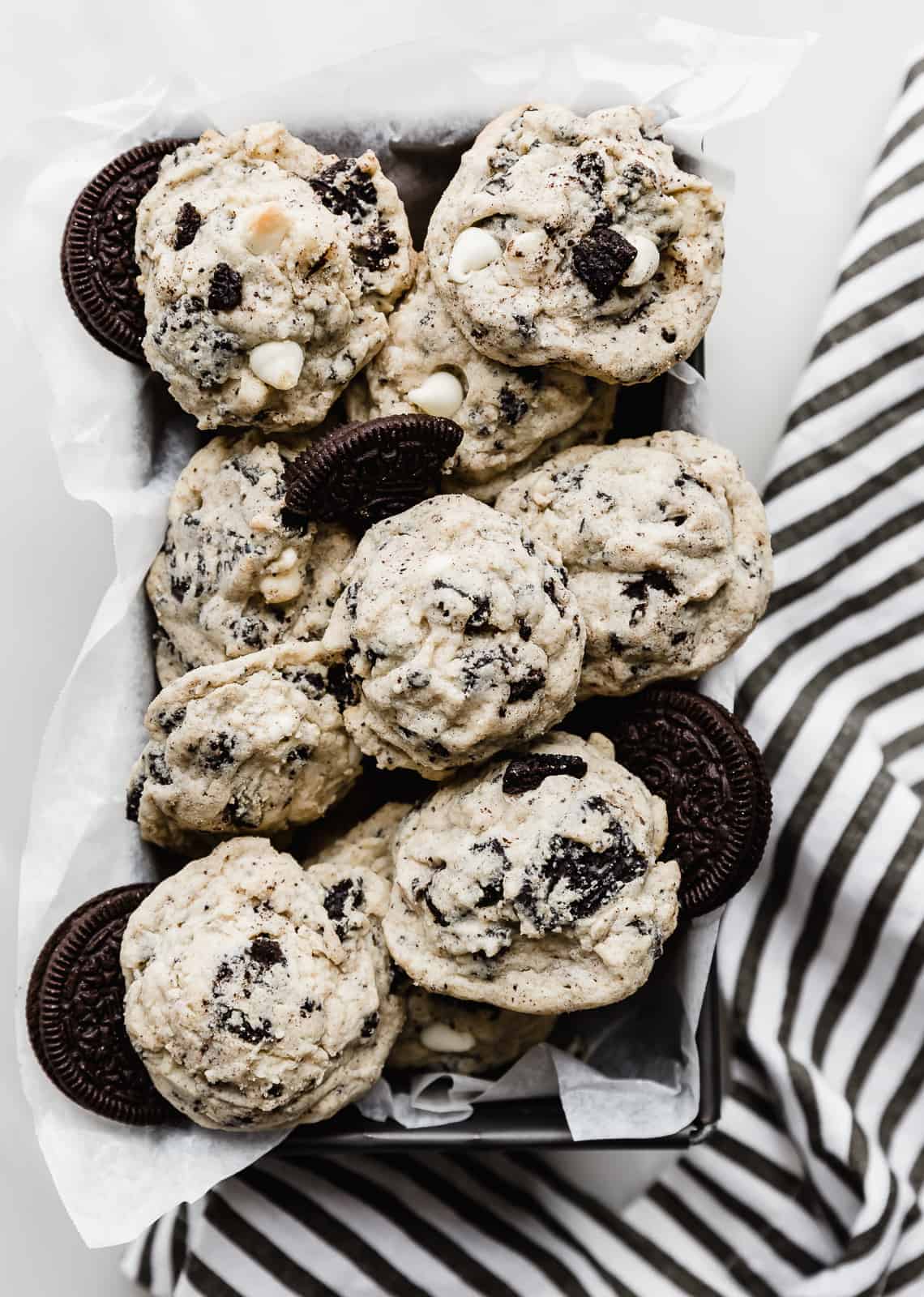Cookies and Cream Cookies in a bread pan against a white background.