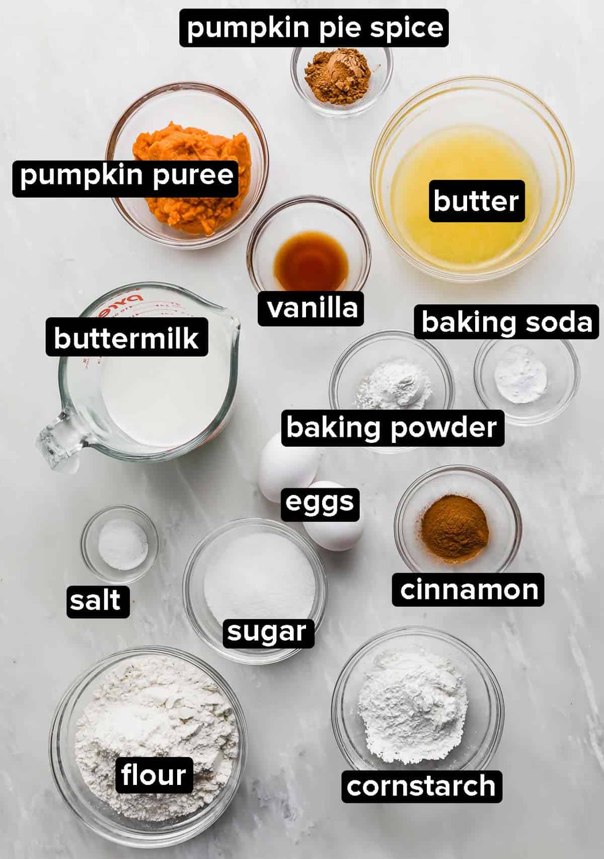 Pumpkin Waffle ingredients on a marble table.