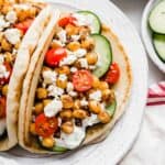 Chickpea Gyros topped with feta, tomatoes, and cucumbers.