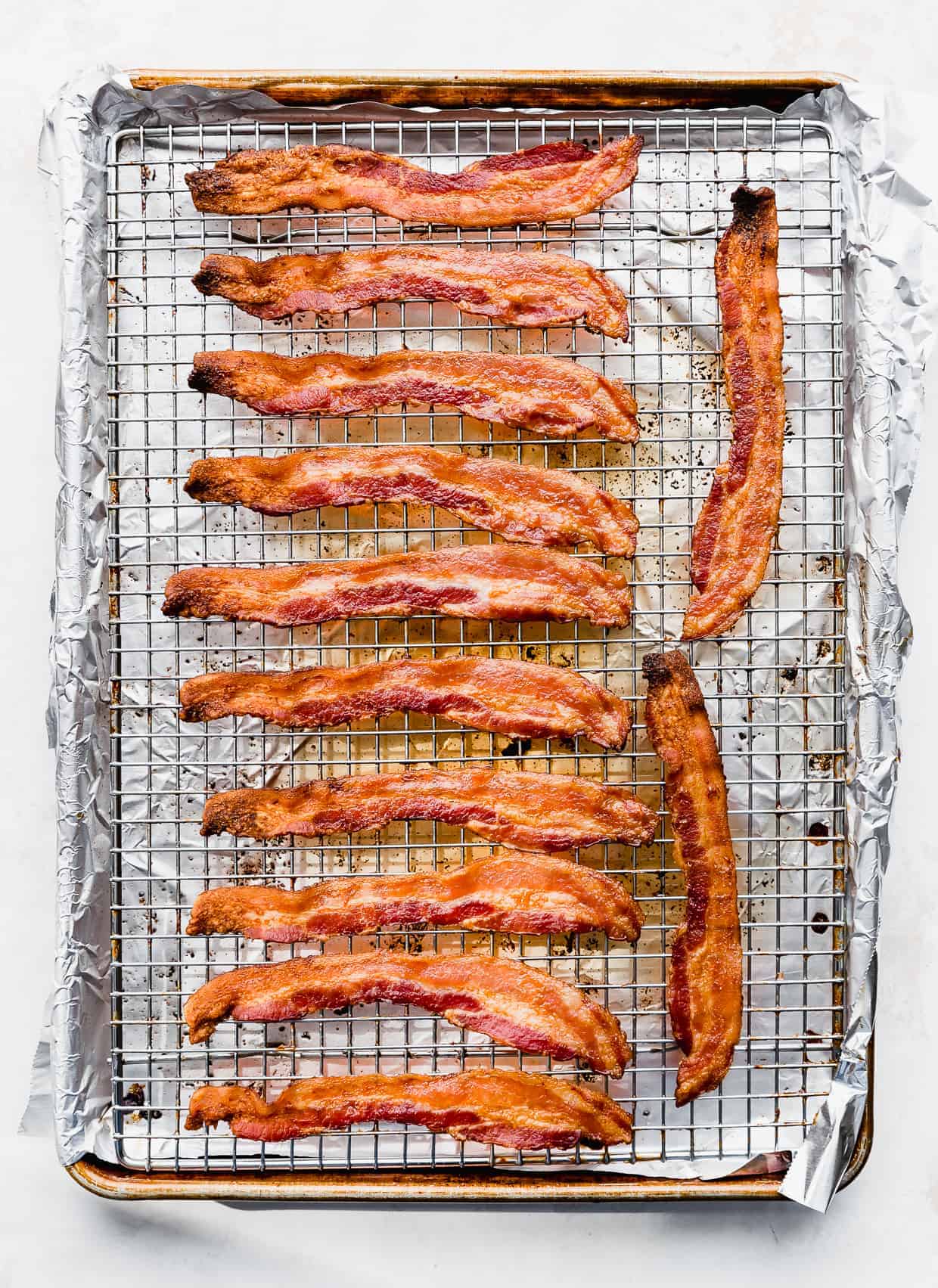 Crispy bacon on a wire rack, fresh out of the oven. 