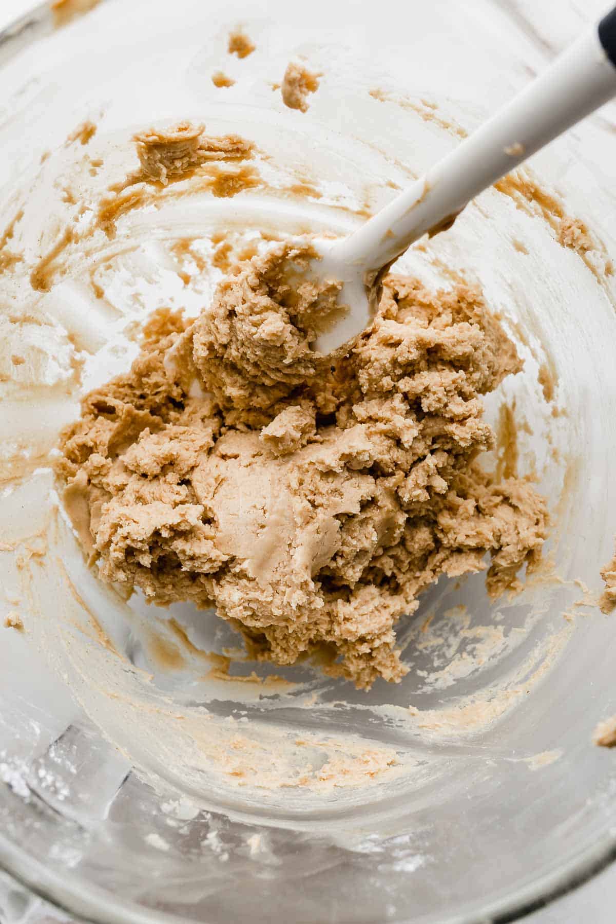 Peanut butter filling in a glass bowl used in Buckeye Brownies recipe.