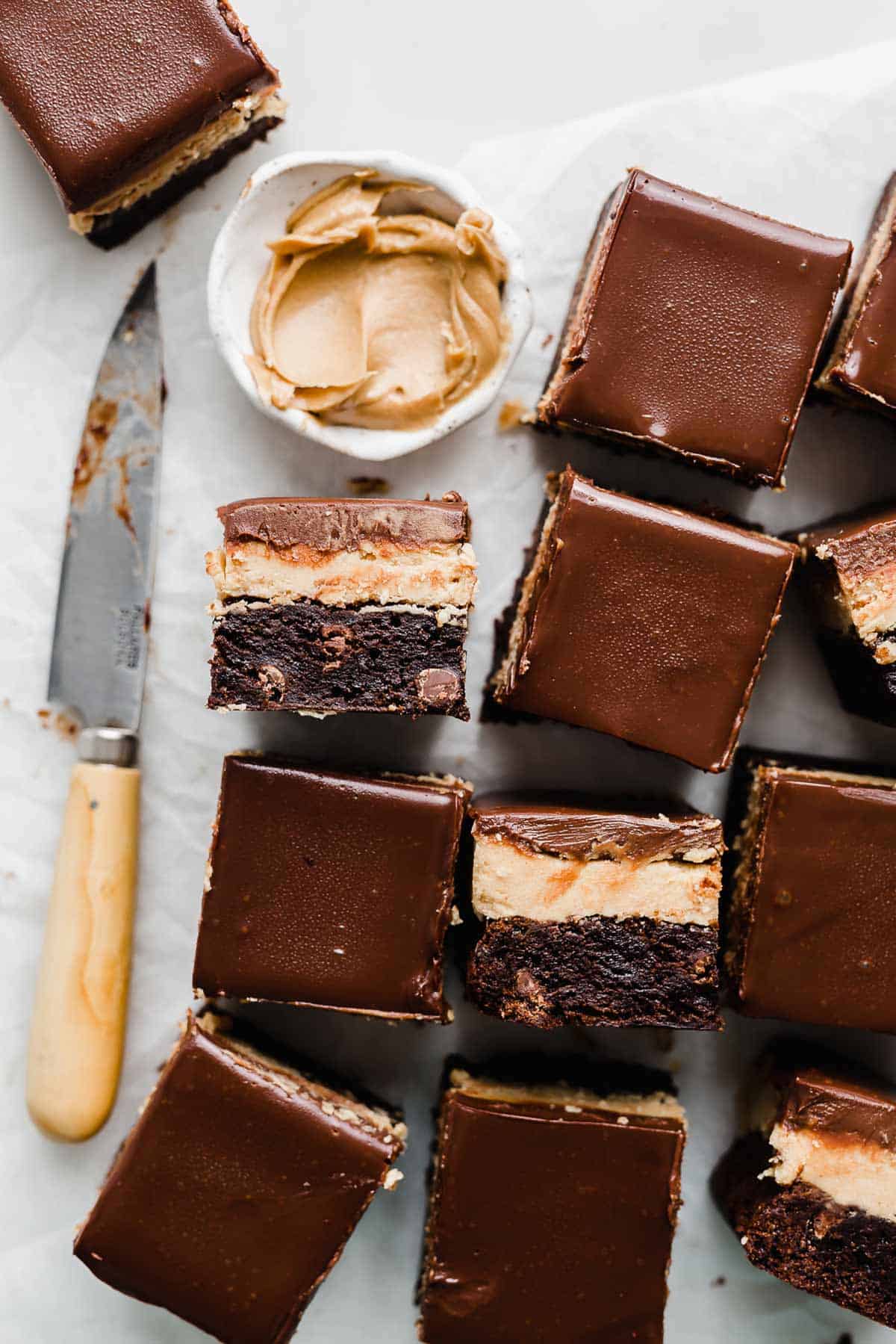 Buckeye Brownies cut into squares, on a white background.