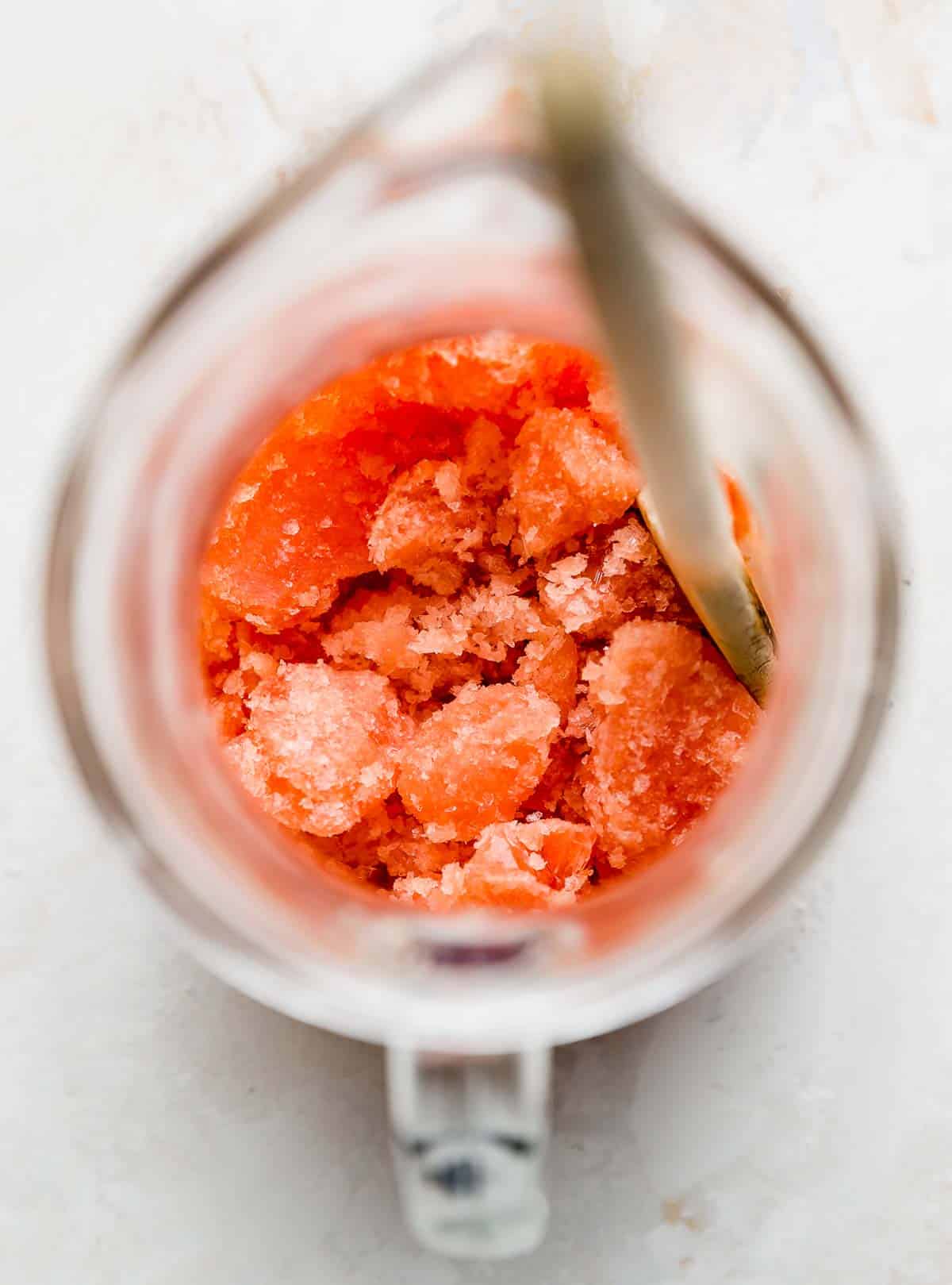 Overhead photo of cranberry slush in a pitcher.