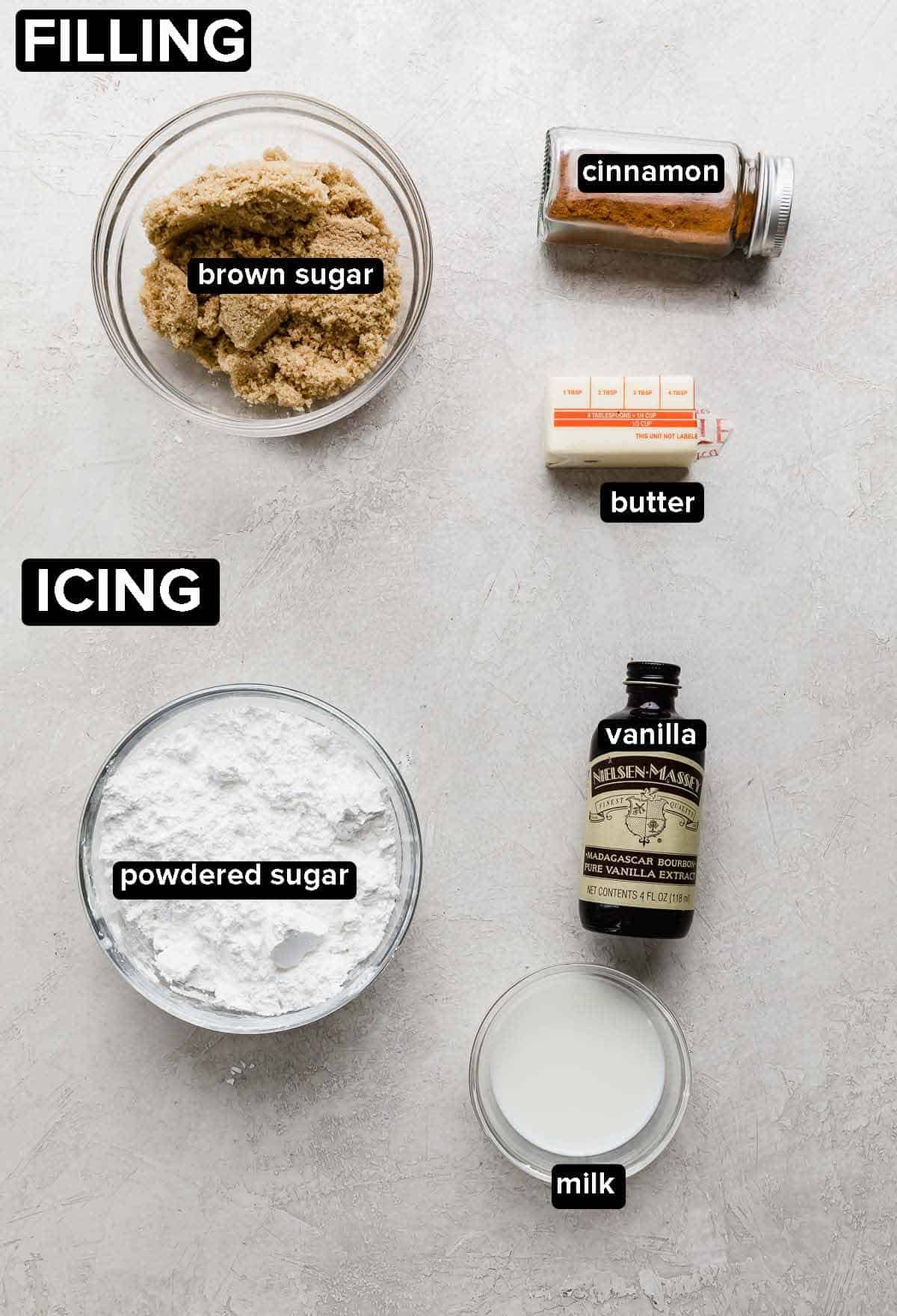 Ingredients used to make Cinnamon Roll Cookies filling and icing on a light gray background.