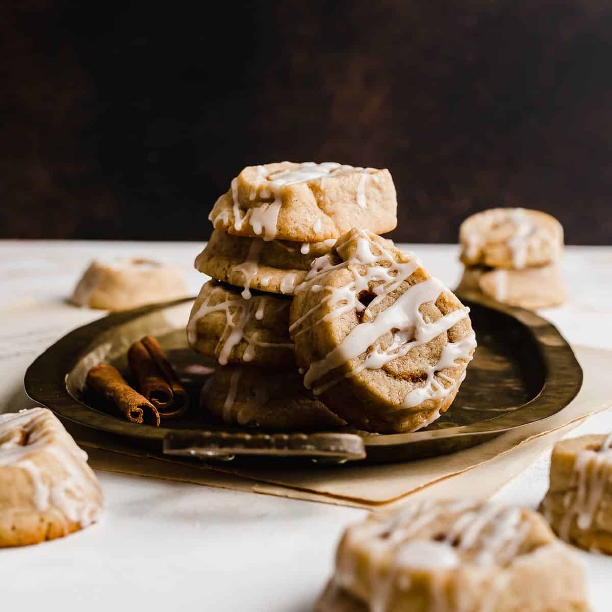Cinnamon Roll Cookies against a brown background.