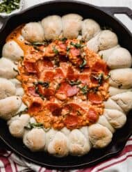 A Pepperoni Pizza Dip in a skillet.