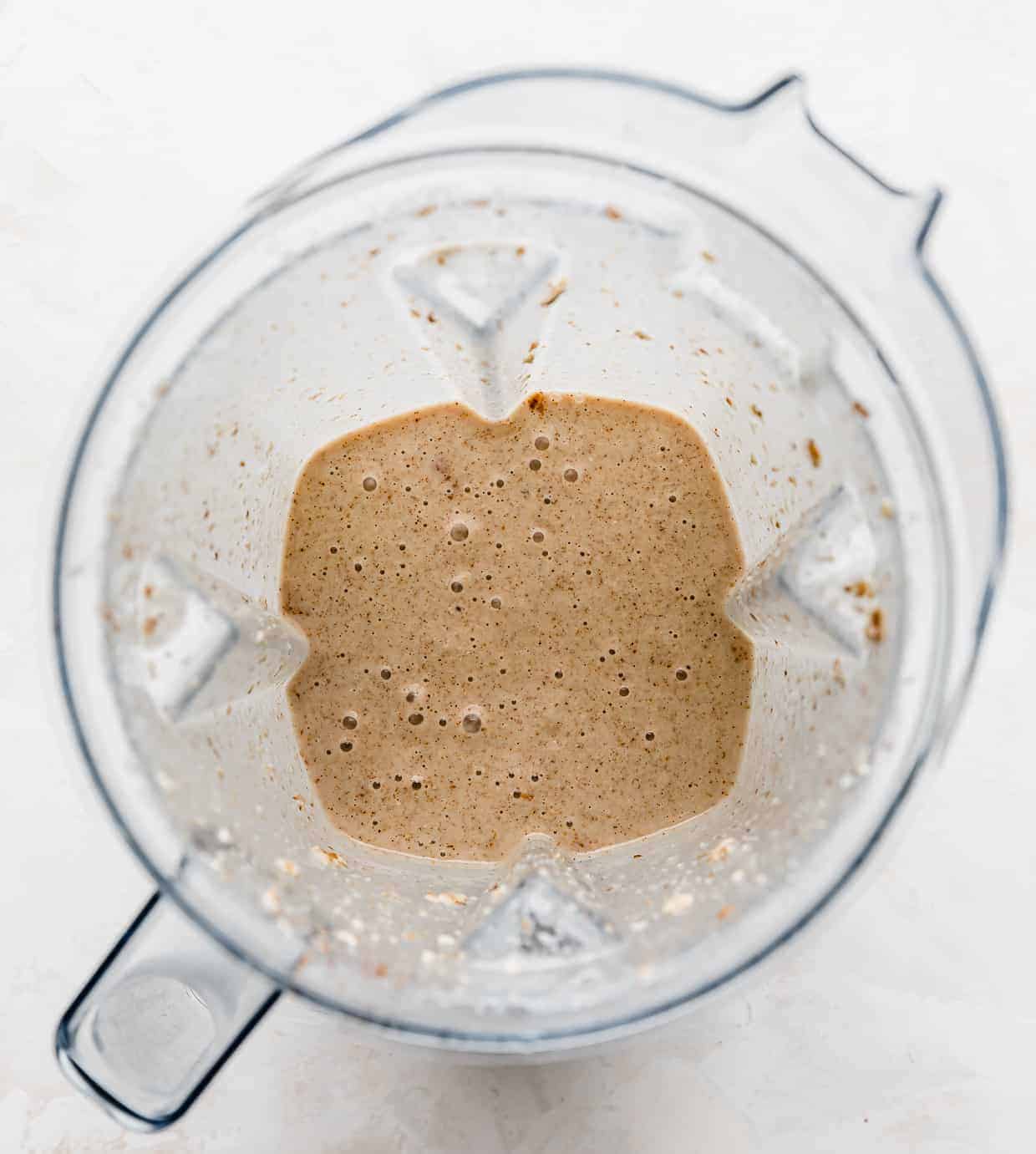 A brown colored Lactation Smoothie in a blender.