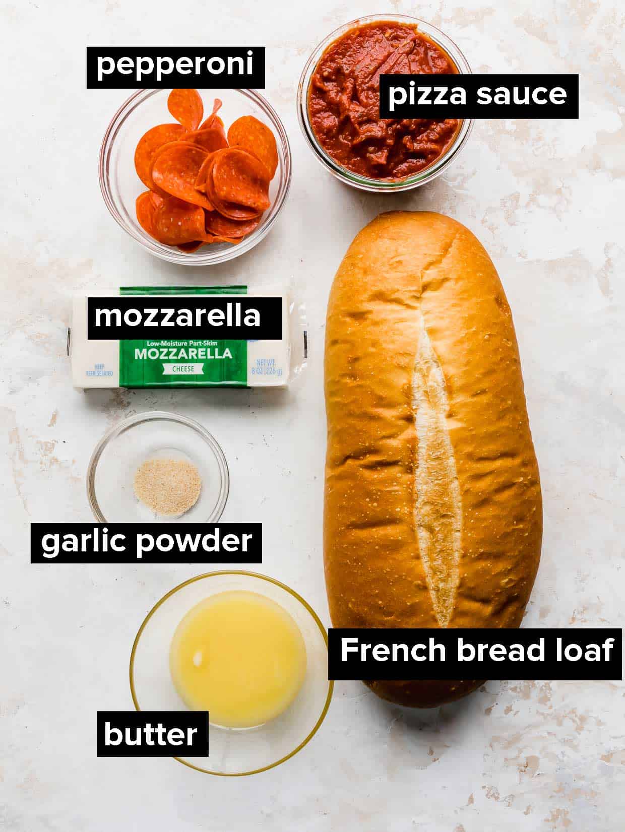 Ingredients used to make French bread pizza.