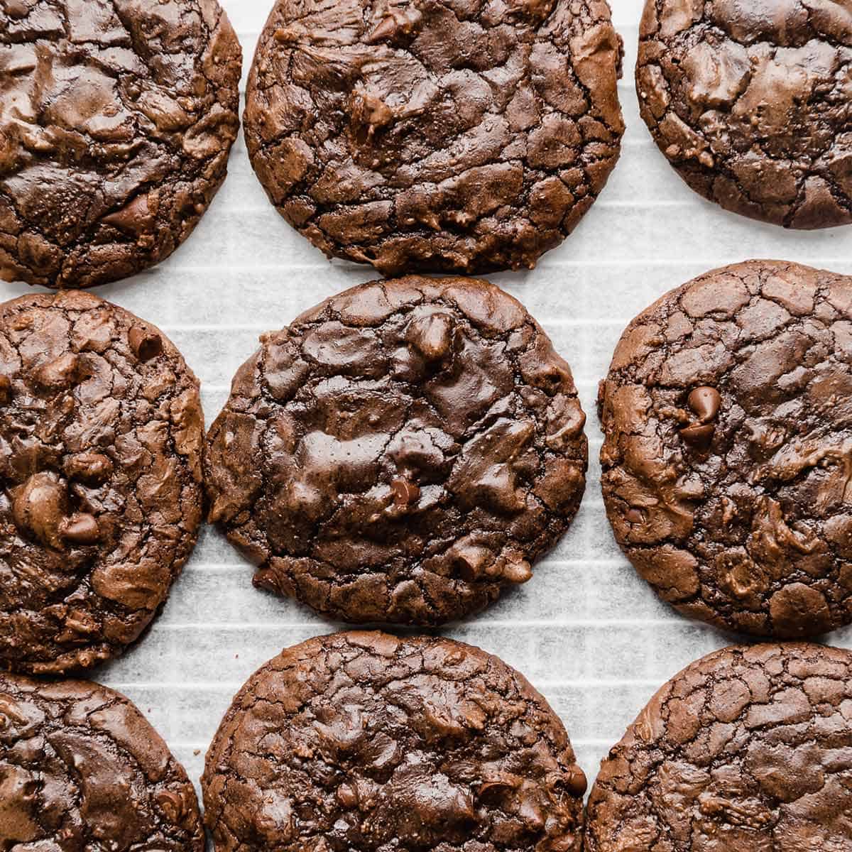 overhead photo of Brownie Mix Cookies on a white parchment paper.