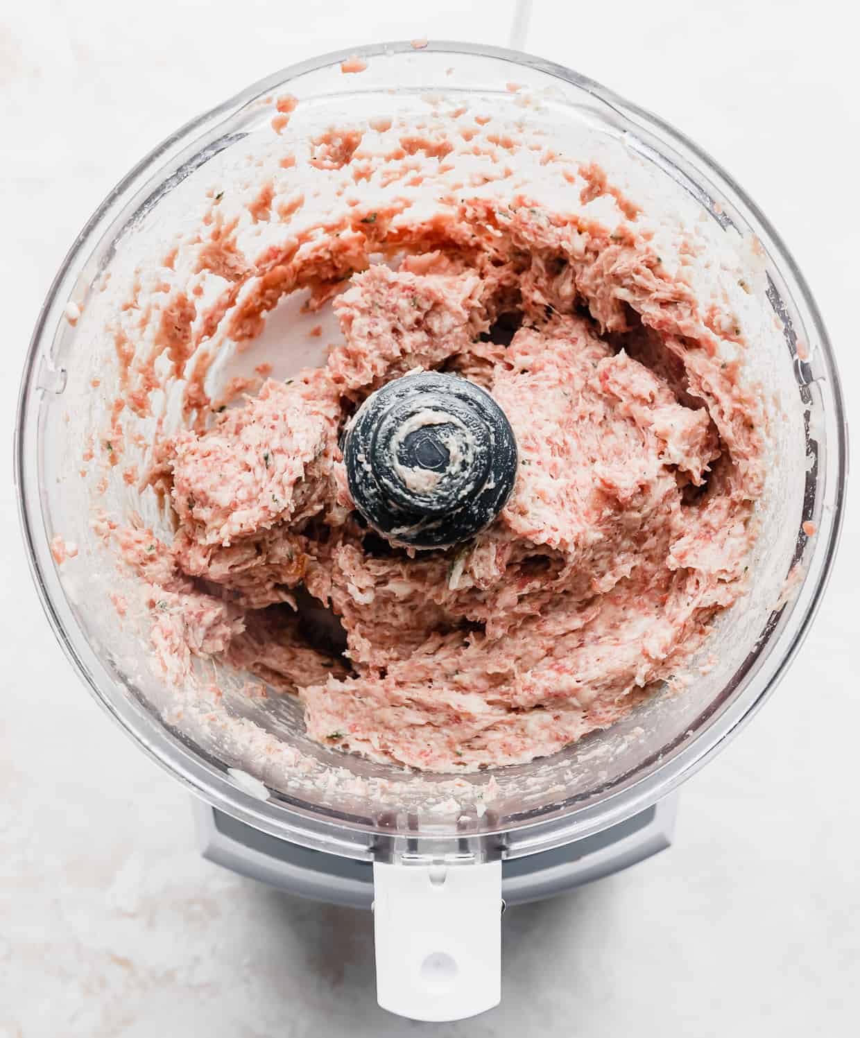 Ground lamb gyro meat in a food processor.