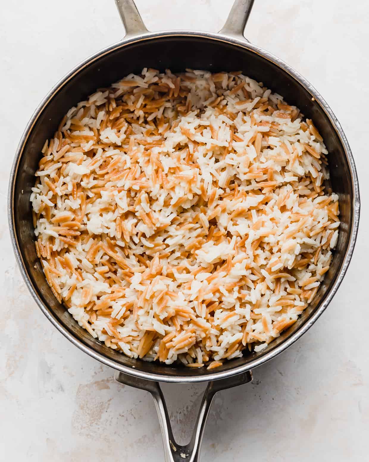 Cooked Orzo Rice in a saucepan.