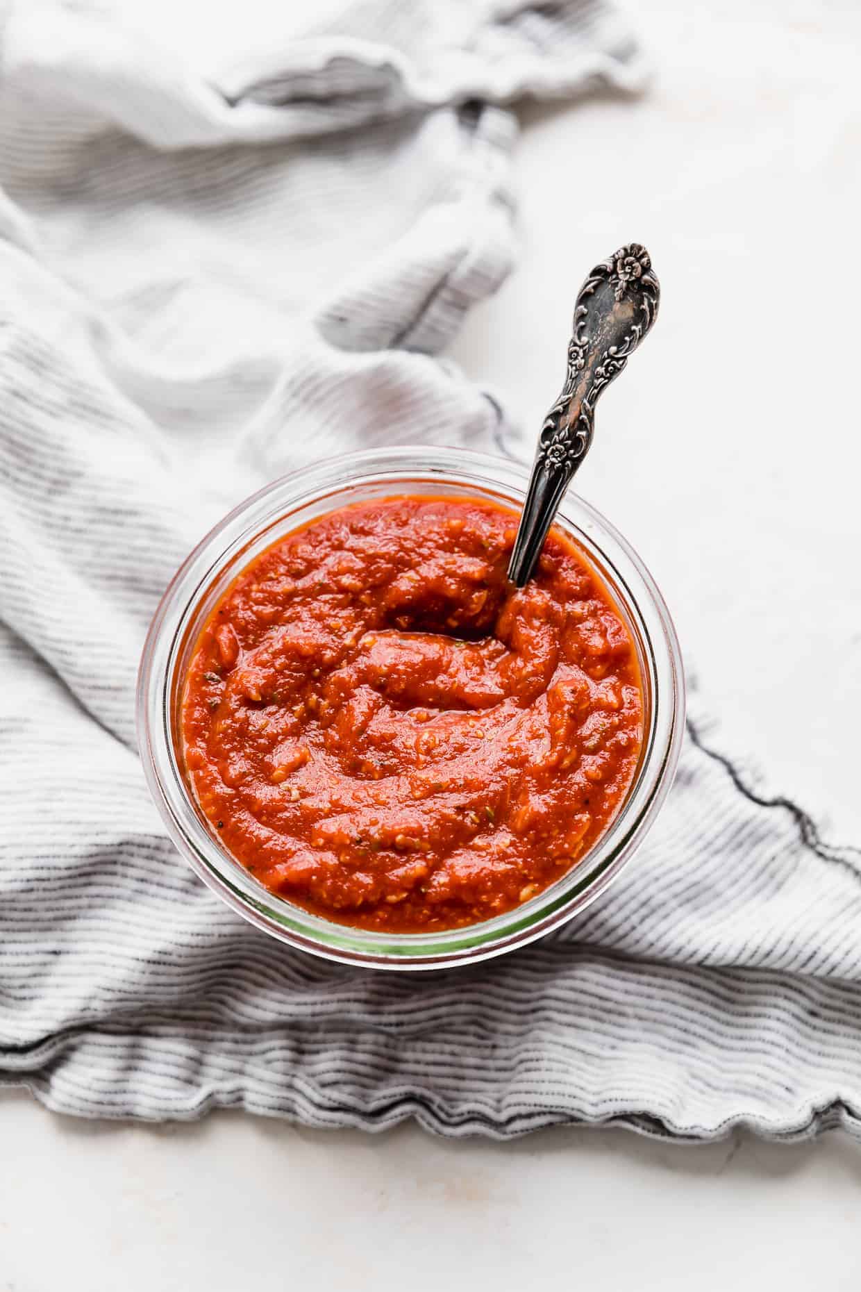 An overhead photo of a jar of Pizza Sauce made from Tomato Paste. 