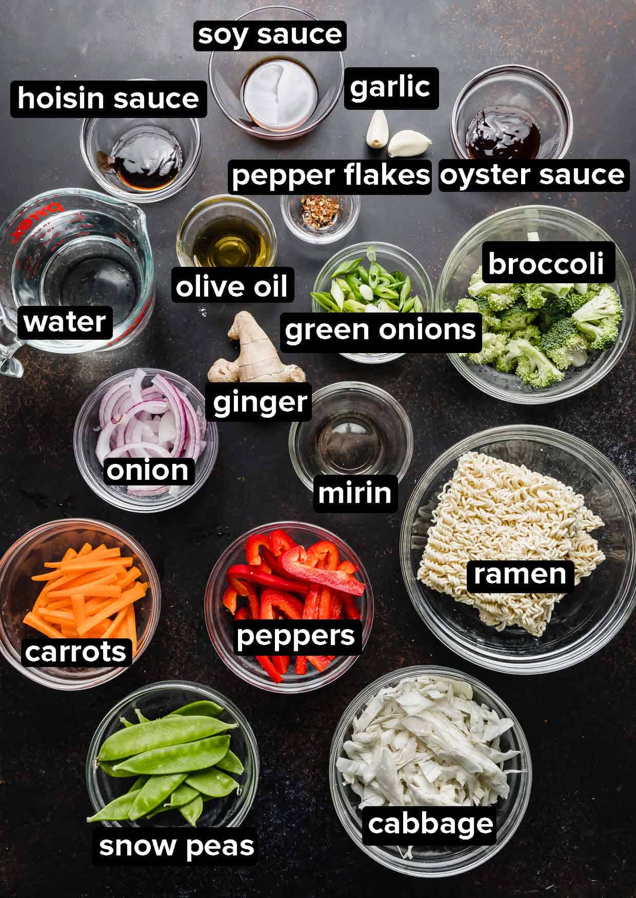 Ingredients used to make ramen with vegetables on a brown background. 