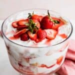 A Strawberry Shortcake Trifle topped with fresh strawberries.