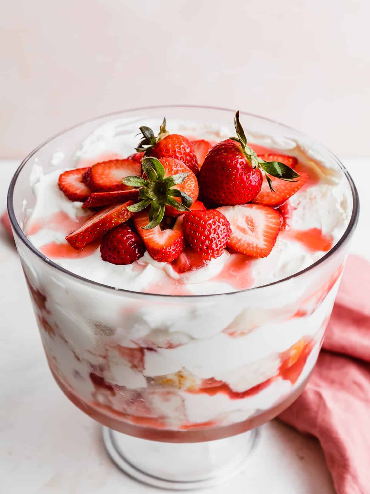 A Strawberry Shortcake Trifle topped with fresh strawberries.