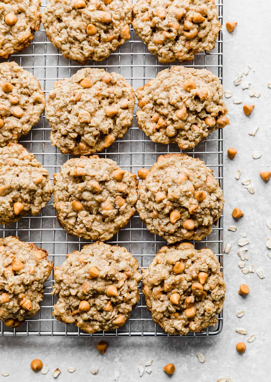 Oatmeal Butterscotch Cookies on a wire cooling rack, against a white background.