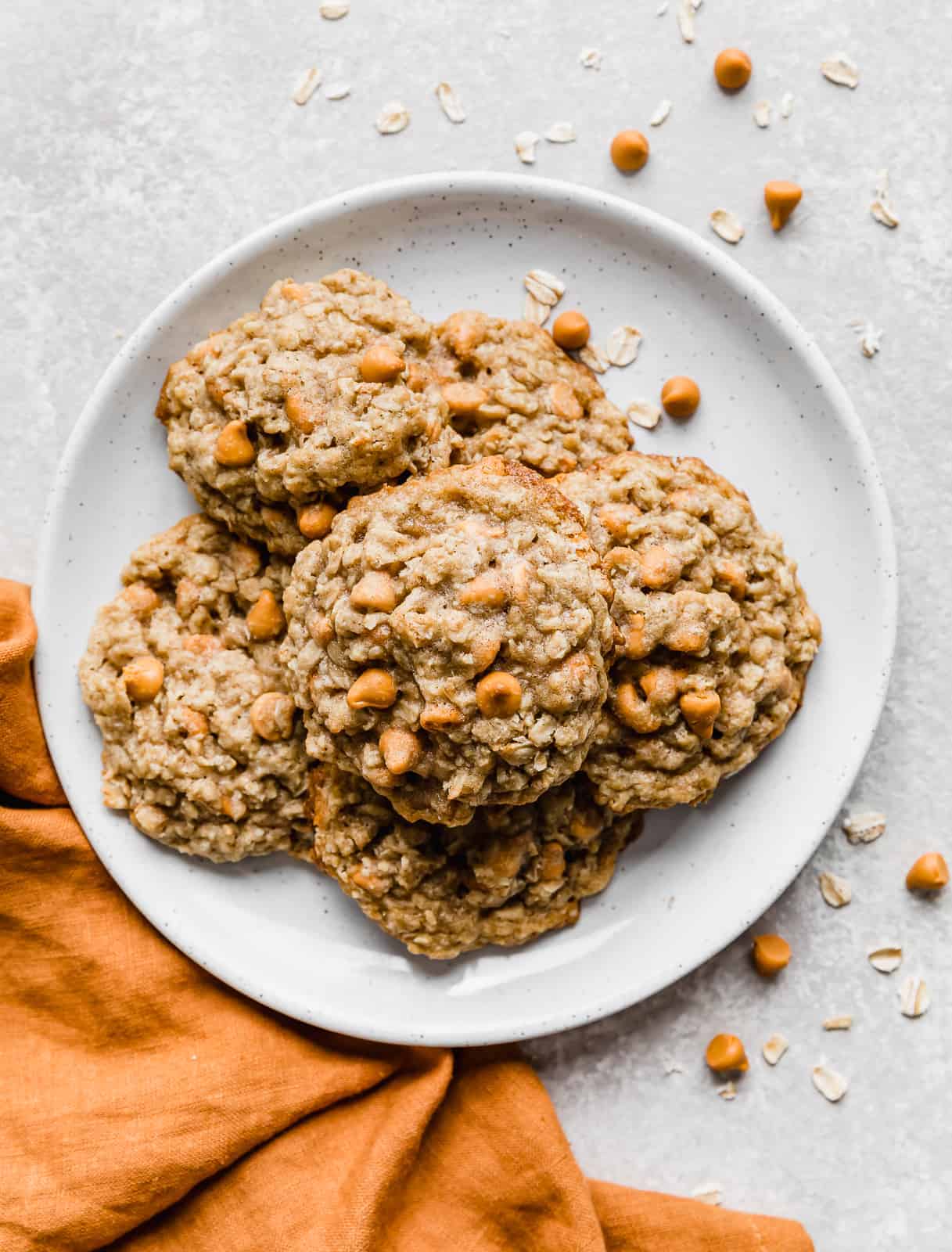 A white plate with Oatmeal Butterscotch Cookies on it.