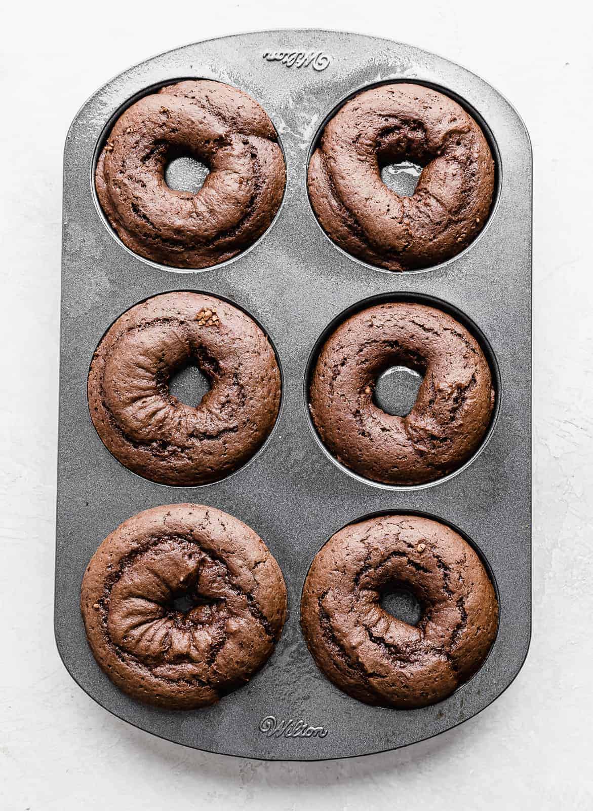 Baked Chocolate Doughnuts in a donut pan.