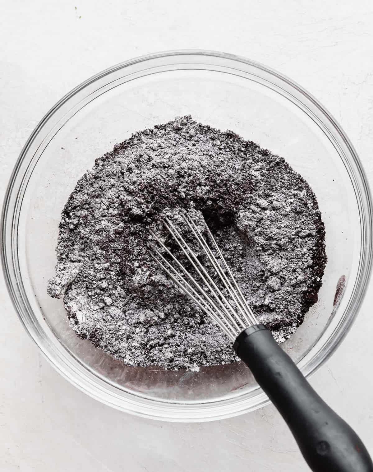 Dry ingredients to make Oreo Donuts in a glass bowl.