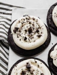 A Chocolate Oreo Crumbl Cookie on a white plate.