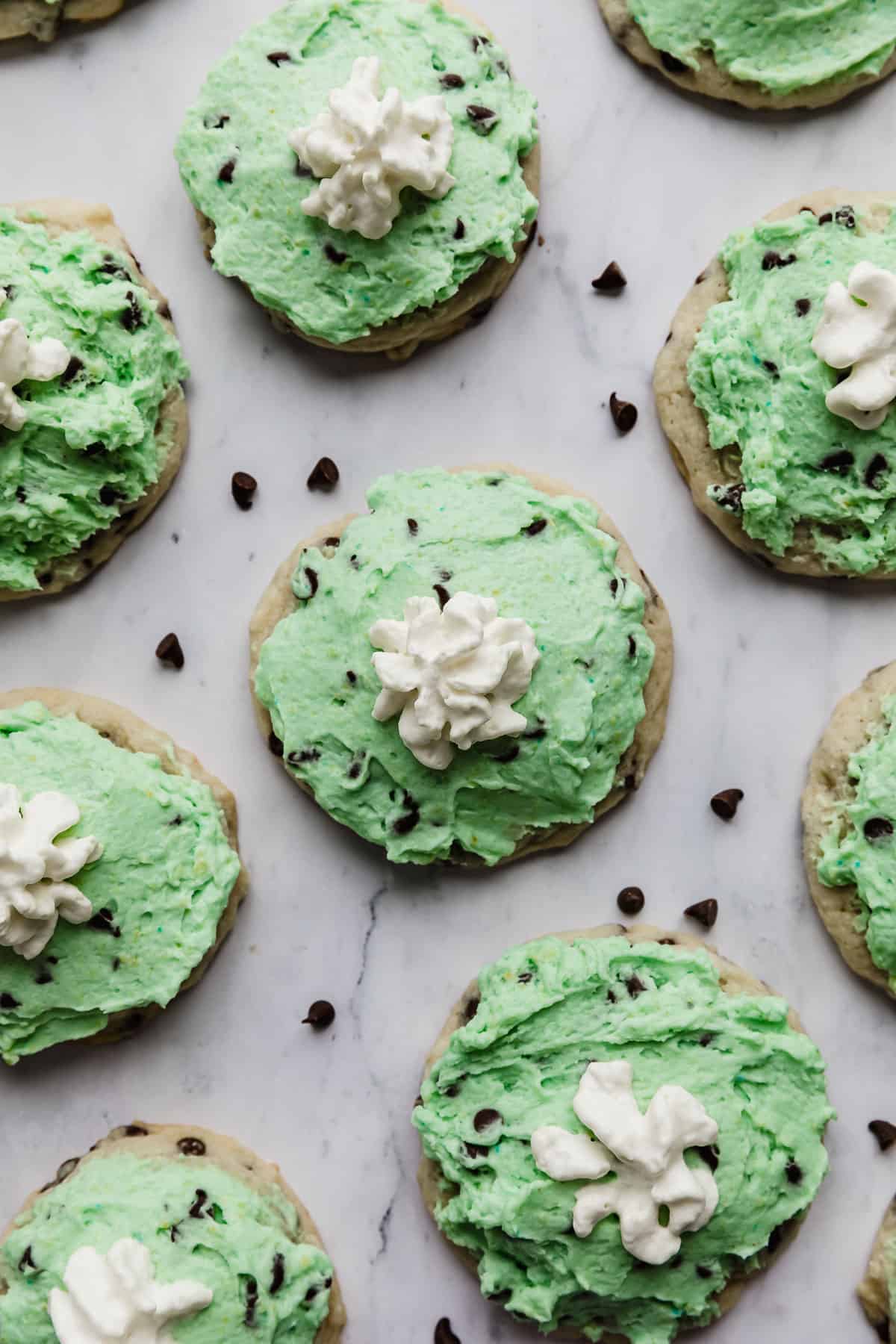 Crumbl Mint Chip Ice Cream Cookies on a white marble background.