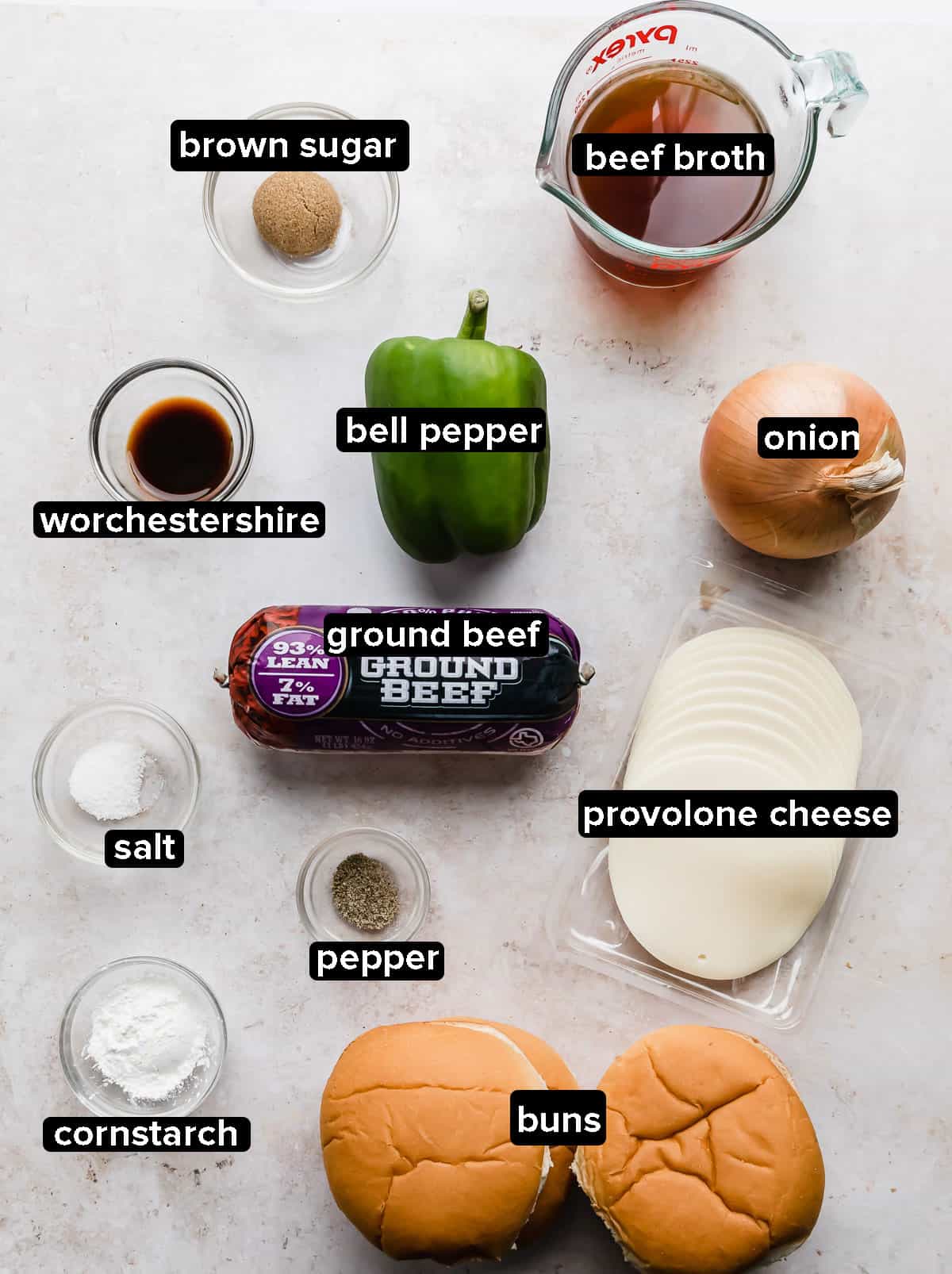 Philly Cheesesteak Sloppy Joes ingredients on a white background.