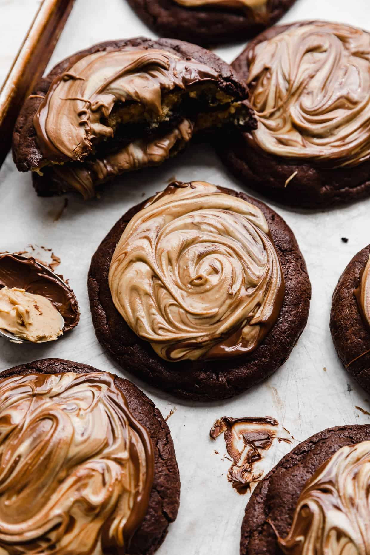 Chocolate and peanut butter swirled on top of a brownie cookie.