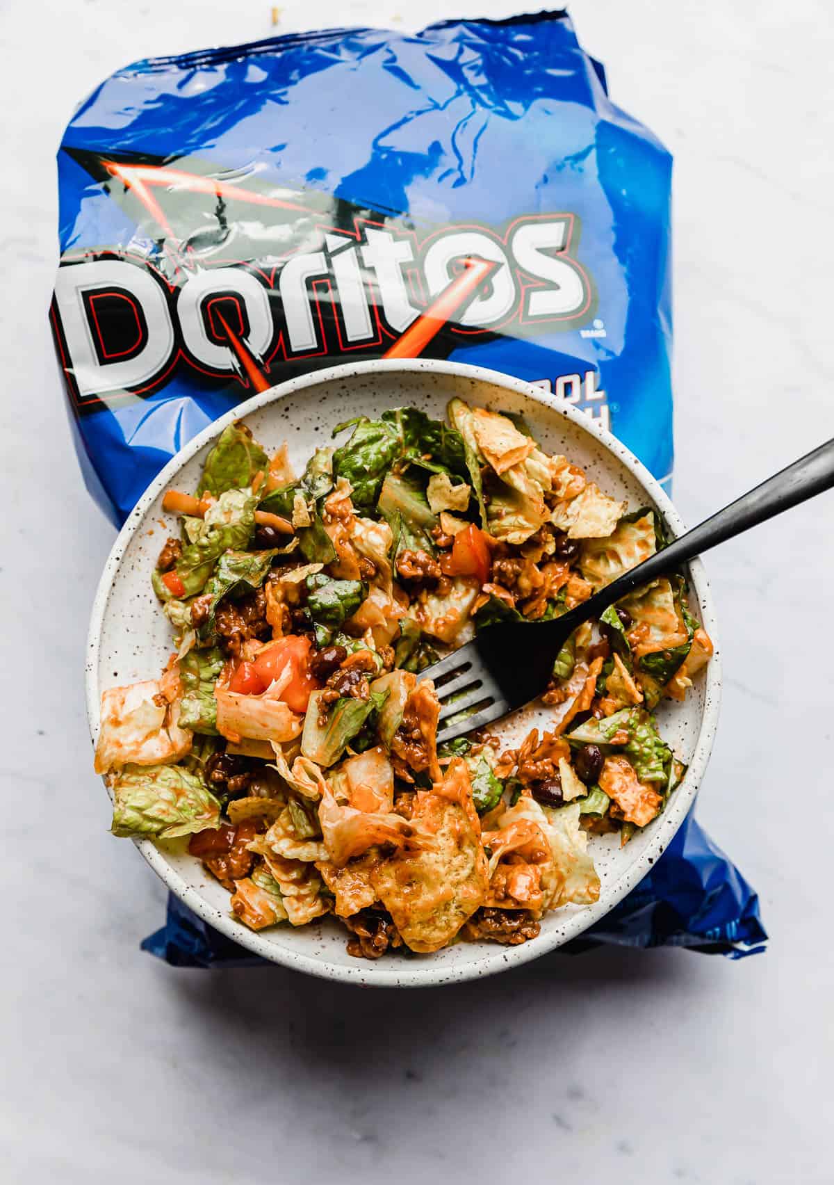 https://saltandbaker.com/wp-content/uploads/2022/03/Doritos-Taco-Salad-1.jpg