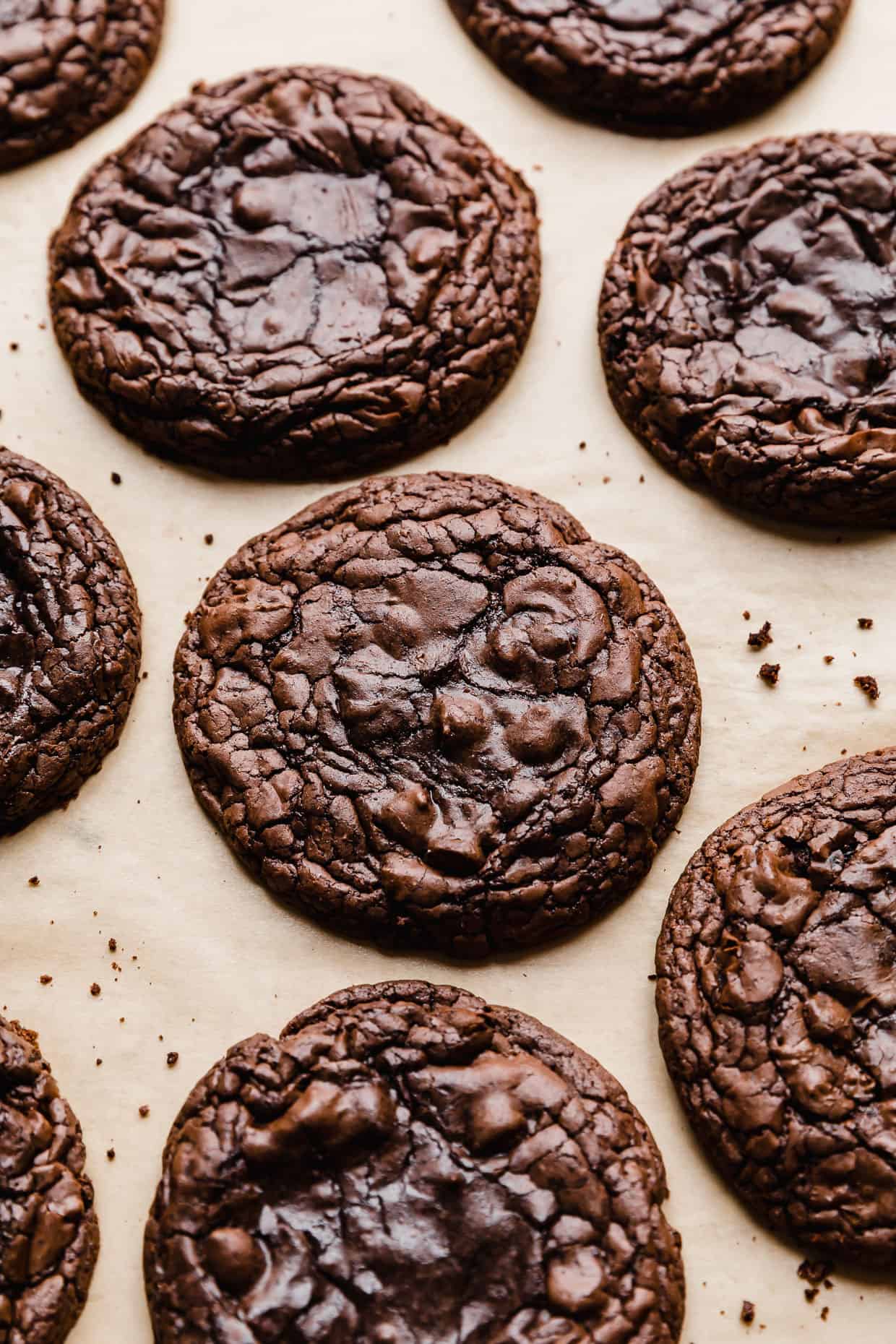 Crumbl Brownie Batter Cookies on a tan background.