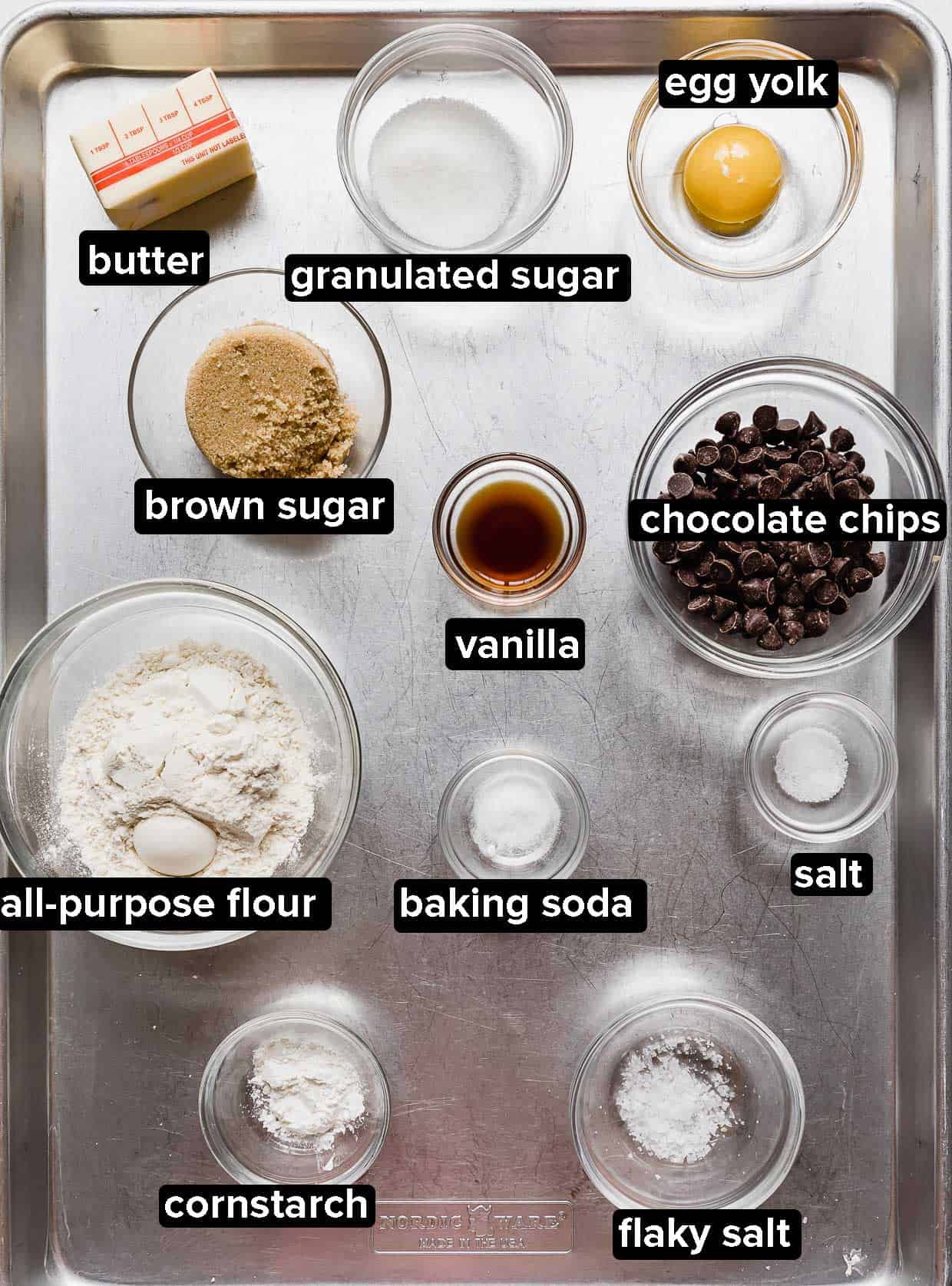 Small Batch Chocolate Chip Cookie ingredients on a silver baking sheet.
