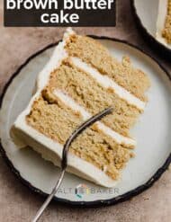 A slice of a three layered cake on a plate with words, "Brown Butter Cake" written in white letters over the image.