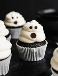 Ghost Cupcakes against a black background.