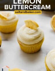 A lemon cupcake topped with lemon frosting with the words, "Lemon Buttercream" written in white text over the photo.