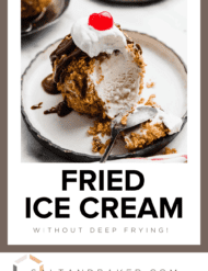 A spoon scooping into a ball of no fry Fried Ice Cream on a black rimmed white plate.