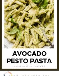 Creamy and healthy Avocado Pesto Pasta topped with fresh basil.