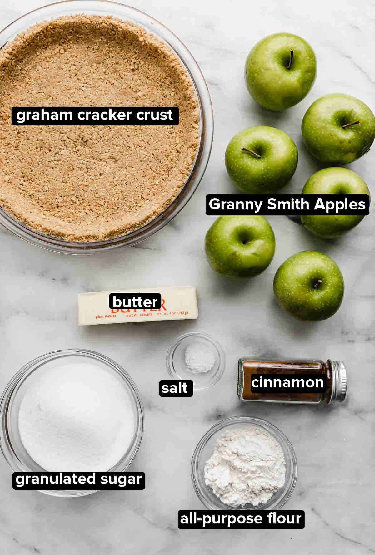 Apple Pie with Graham Cracker Crust ingredients including a graham cracker crust, Granny Smith apples, butter, sugar, flour, cinnamon, salt.