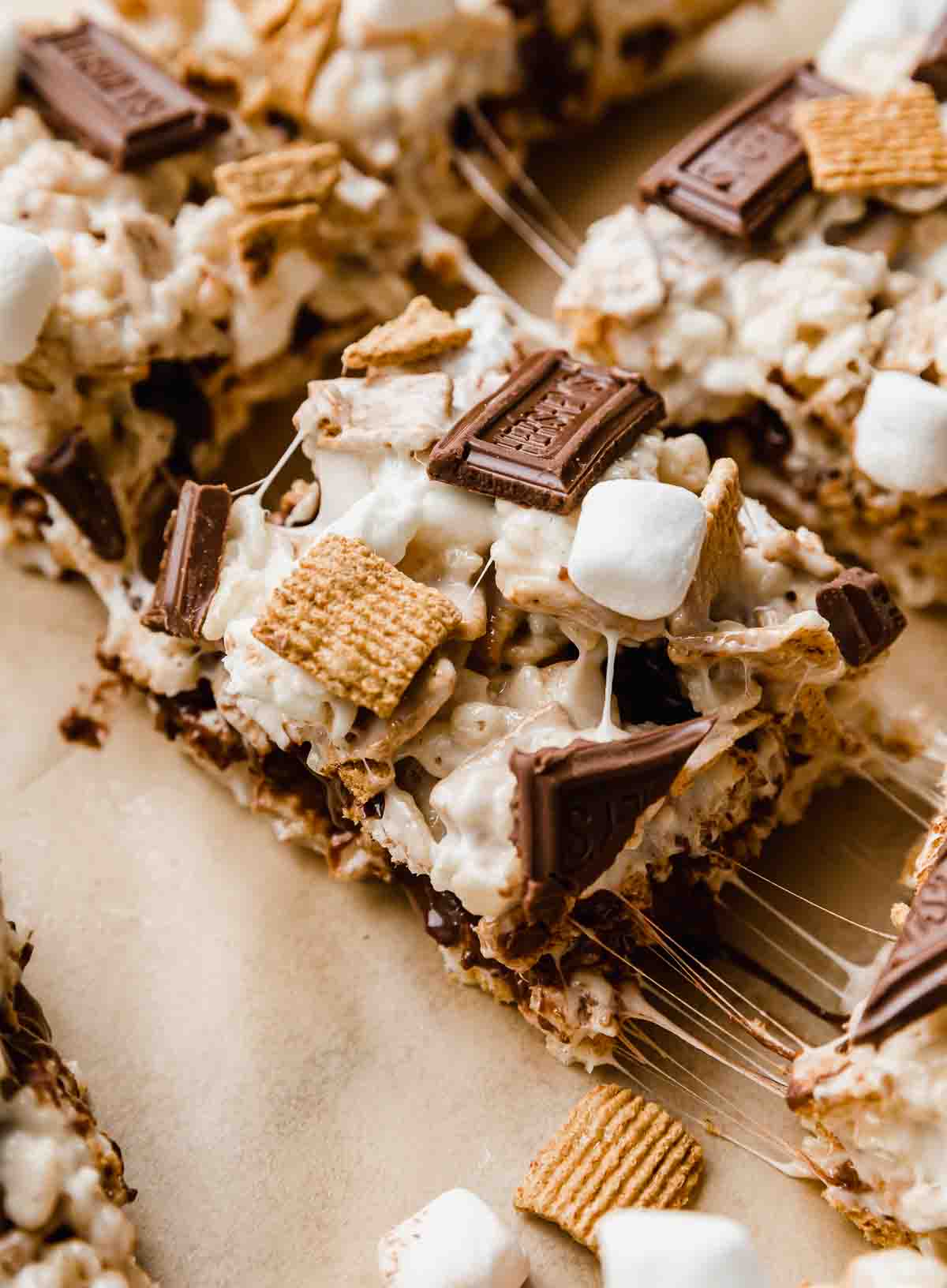the best S'more Rice Krispie Treats on a Kraft colored parchment paper.