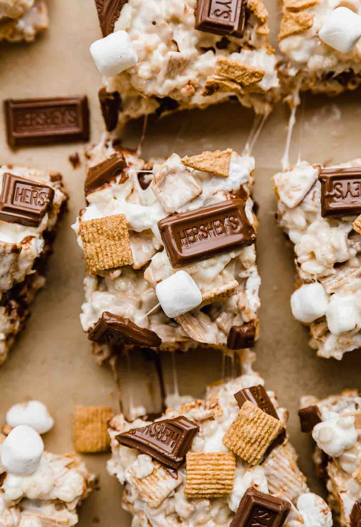 Overhead photo of a S'more Rice Krispie Treats on a Kraft colored parchment. 