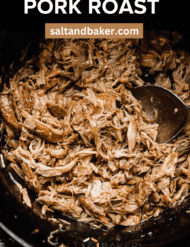 Shredded pork roast in a crock pot with the words, "Pork Roast" written in white text above the photo.