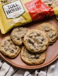 Nestle Toll House Chocolate Chip Cookies on a brown plate.