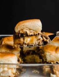 Breakfast Slider on a metal spatula against a black background.