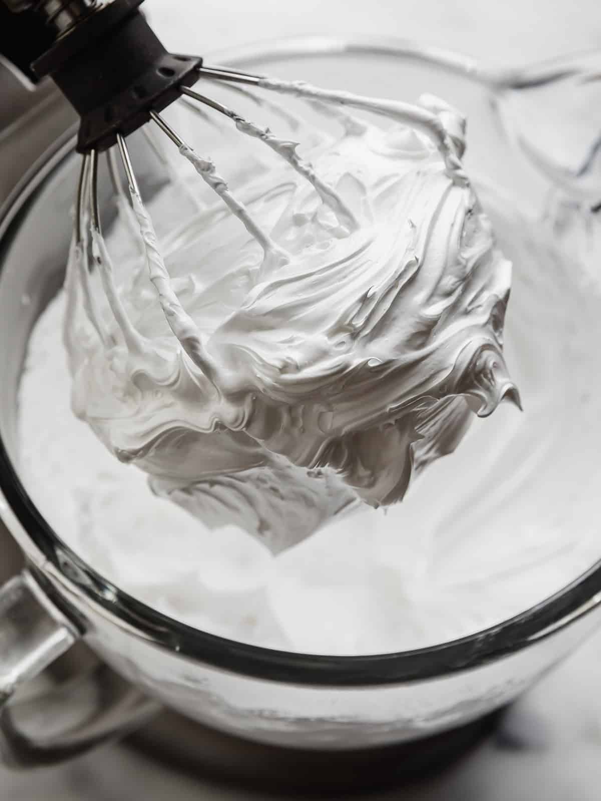Homemade Marshmallow Cream on a wire whisk.