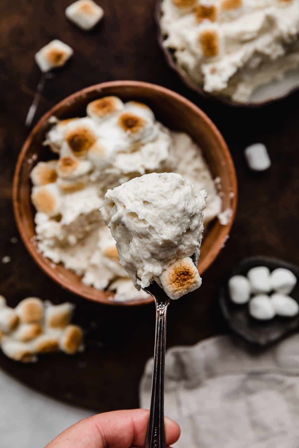 Toasted Marshmallow Frosting on a spoon.