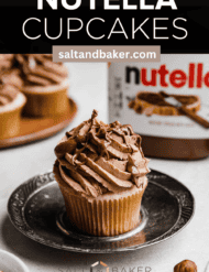 The best Nutella Cupcakes recipe topped with Nutella frosting on a black vintage plate, with the words, "Nutella Cupcakes" written in white text above the photo.