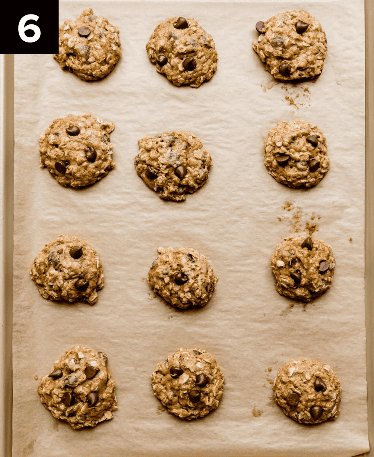 Baked Chocolate Chip Oatmeal Pumpkin Cookies on a baking tray.