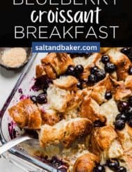 A breakfast casserole with blueberries and croissants with the words, "Blueberry Croissant Breakfast" written in white text above the photo.