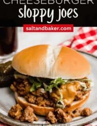 A photo of a bun with cheeseburger sloppy Joe mixture on it with the words, "Cheeseburger Sloppy Joes" written in white text above the image.